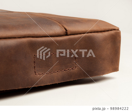 Bandmade brown leather seat cushion with hook-and-loop fastener Bandmade brown leather seat cushion with hook-and-loop fastener 98984222