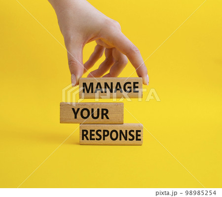 Manage your response symbol. Concept words Manage your response on wooden blocks. Businessman hand. Beautiful yellow background. Business and Manage your response concept. Copy space Manage your response symbol. Concept words Manage your response on wooden blocks. Businessman hand. Beautiful yellow background. Business and Manage your response concept. Copy space 98985254