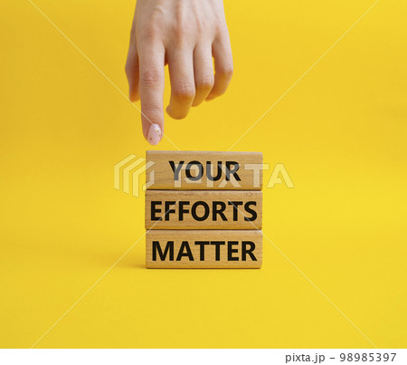 Your Effort Matter symbol. Wooden blocks with words Your Effort Matter. Beautiful yellow background. Businessman hand. Business and Your Effort Matter concept. Copy space. Your Effort Matter symbol. Wooden blocks with words Your Effort Matter. Beautiful yellow background. Businessman hand. Business and Your Effort Matter concept. Copy space. 98985397