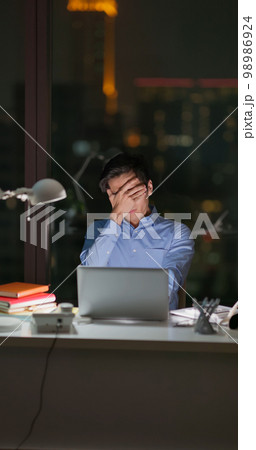 Business man frustrated at work Business man frustrated at work 98986924