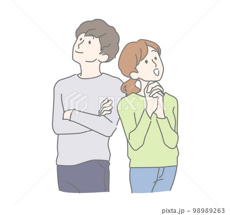 それぞれ上を見上げて笑顔の若い男女、夫婦 それぞれ上を見上げて笑顔の若い男女、夫婦 98989263