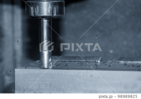 The CNC milling machine rough cutting the injection mold parts by indexable tools. 98989825