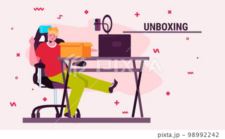 young guy blogger unboxing purchase streaming live social media network shopping blog generation Z lifestyle concept 98992242