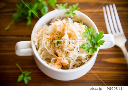 sauerkraut with carrots and spices in a bowl sauerkraut with carrots and spices in a bowl 98993114