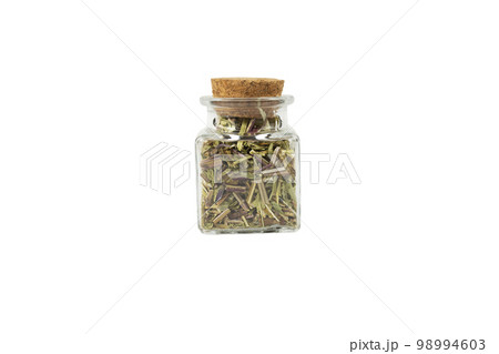Catnip herb in latin - Nepeta cataria in a glass jar isolated on white background. Medicinal herb. 98994603