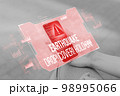 A person is holding a smartphone with an abstract earthquake notification and need to be saved. 98995066