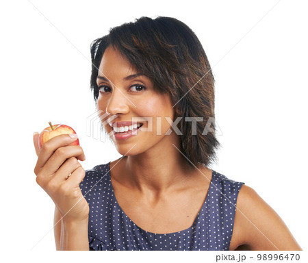 Health, apple and smile with portrait of black woman for diet, nutrition or organic choice. Food, vitamins and fiber snack with isolated Brazil girl and fruit for natural, weight loss or clean eating 98996470