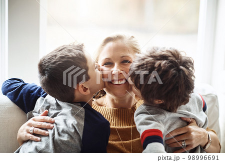 Kiss, happy and portrait of a mother with...の写真素材 [98996691