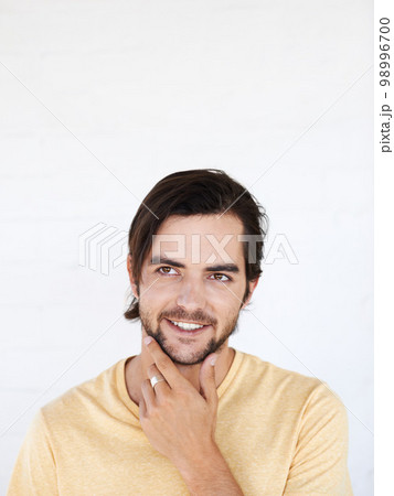 Idea, studio mockup and man thinking, pensive and focus on contemplating problem solving plan. Marketing space, advertising mock up and product placement for model isolated on white background wall Idea, studio mockup and man thinking, pensive and focus on contemplating problem solving plan. Marketing space, advertising mock up and product placement for model isolated on white background wall 98996700