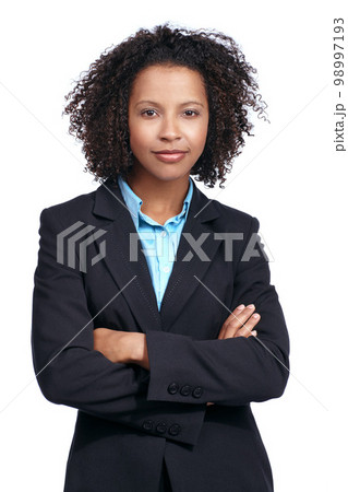 Black woman, business studio portrait and arms crossed, vision and suit by white background. Corporate leader woman, focus and proud with smile, strategy or mission for motivation, success and goals Black woman, business studio portrait and arms crossed, vision and suit by white background. Corporate leader woman, focus and proud with smile, strategy or mission for motivation, success and goals 98997193