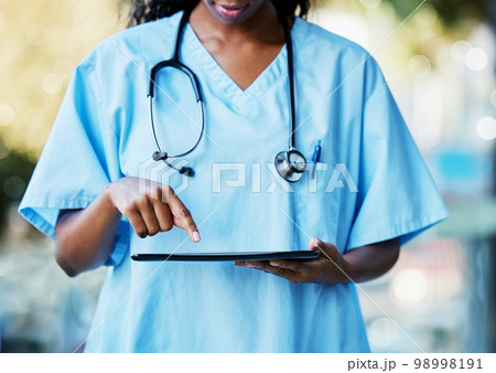 Doctor hands, tablet technology and medical research, healthcare software and hospital management app. Nurse black woman or expert person on digital tech services for clinic data analysis or results Doctor hands, tablet technology and medical research, healthcare software and hospital management app. Nurse black woman or expert person on digital tech services for clinic data analysis or results 98998191
