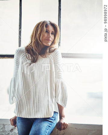 Woman, thinking and relax against window in her home, calm and content while daydreaming on mockup. Contemplating, girl and confident, beautiful and peaceful female satisfied, thoughtful and relaxed Woman, thinking and relax against window in her home, calm and content while daydreaming on mockup. Contemplating, girl and confident, beautiful and peaceful female satisfied, thoughtful and relaxed 98998972