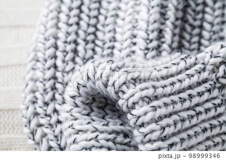 Texture of the fabric of a winter sweater 98999346