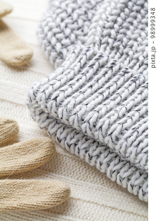 Texture of the fabric of a winter sweater Texture of the fabric of a winter sweater 98999348