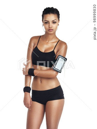 Music, fitness and sports with woman and phone for workout, health and cardio training. Podcast, mobile radio and motivation with portrait girl listening to earphones for exercise, streaming and goal 98999830