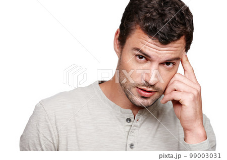 Thinking, fashion and portrait of man on a white background with trendy, stylish and casual clothes. Serious attitude and fashion model isolated in studio with confidence, ideas and thoughtful Thinking, fashion and portrait of man on a white background with trendy, stylish and casual clothes. Serious attitude and fashion model isolated in studio with confidence, ideas and thoughtful 99003031