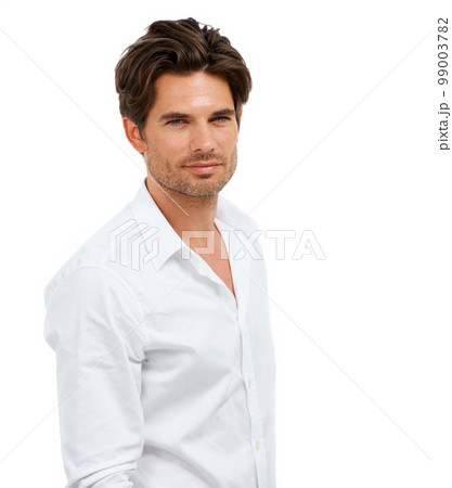 Portrait, beauty and model with a handsome man in studio isolated on a white background for fashion. Face, aesthetic and an attractive young male posing as a fashion model for contemporary style 99003782
