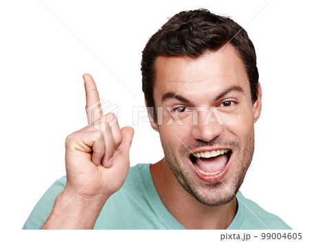 Portrait, excited and mockup with a man in studio isolated on a white background for marketing or advertising. Face, pointing and mock up with a happy male posing on blank product placement space 99004605