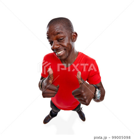 Thumbs up, black man and smile of a person showing yes, thank you and agreement hand sign. Isolated, white background and looking up model standing with winner and success hands gesture with mockup 99005098