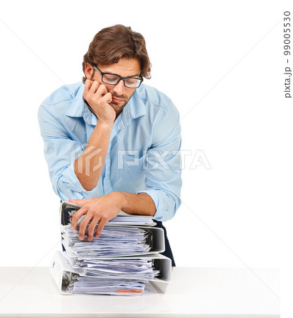 Burnout, stress and businessman with stack of paperwork on desk for deadline, corporate project and report. Ideas, vision and tired employee thinking with pile of files, papers and documents on desk 99005530