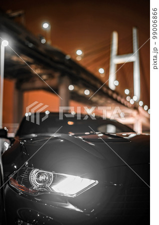 かっこいいスポーツカーのヘッドライトのイメージ 99006866