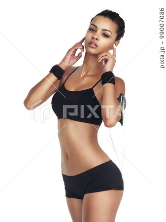 Music, fitness and sports with woman and phone for workout, health and cardio training. Podcast, mobile radio and motivation with portrait girl listening to earphones for exercise, streaming and goal Music, fitness and sports with woman and phone for workout, health and cardio training. Podcast, mobile radio and motivation with portrait girl listening to earphones for exercise, streaming and goal 99007086