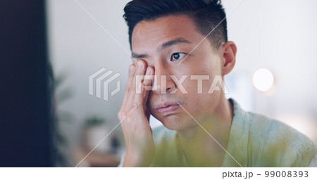 Asian businessman, tired and hand on face in communication office, headache and marketing company. Man, computer or late night reading with burnout, target or kpi at digital marketing agency in Tokyo Asian businessman, tired and hand on face in communication office, headache and marketing company. Man, computer or late night reading with burnout, target or kpi at digital marketing agency in Tokyo 99008393