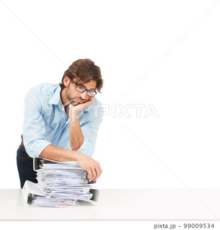 Stress, burnout and businessman with paper, documents and workload pressure on a white background. Overwhelmed, male and corporate employee with boring admin task looking exhausted, sad and isolated 99009534