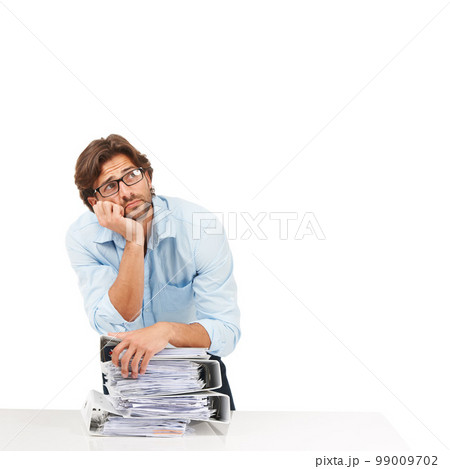 Burnout, stress and businessman with stack of paperwork on desk for deadline, corporate project and report. Ideas, vision and tired employee thinking with pile of files, papers and documents on desk Burnout, stress and businessman with stack of paperwork on desk for deadline, corporate project and report. Ideas, vision and tired employee thinking with pile of files, papers and documents on desk 99009702