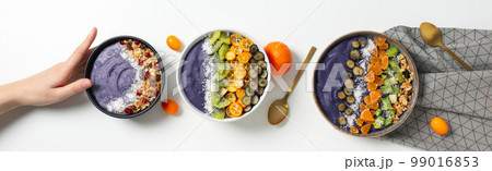 Concept of healthy food with acai smoothie, top view Concept of healthy food with acai smoothie, top view 99016853