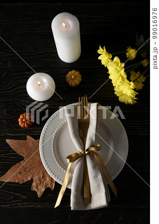 Concept of Thanksgiving day, Autumn table setting, top view Concept of Thanksgiving day, Autumn table setting, top view 99016976