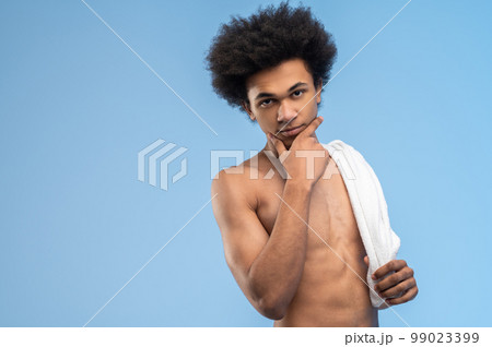 Dark-haired young man after workout 99023399