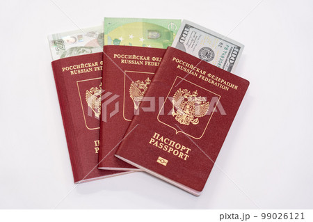 As far as Russian passports with piles of various world currencies nested in them as a symbol of freedom of travel 99026121