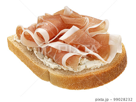 Toast with prosciutto isolated on white background, jamon sandwich Toast with prosciutto isolated on white background, jamon sandwich 99028232