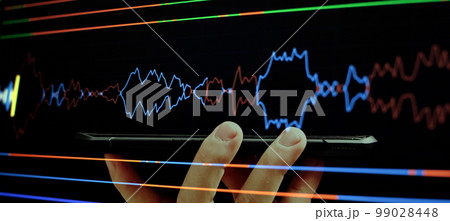 Technical analysis on the monitor of a computer. Fundamental and technical analysis concept. Technical analysis on the monitor of a computer. Fundamental and technical analysis concept. 99028448