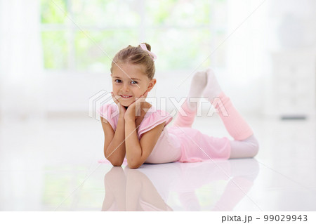 Baby ballet. Little ballerina girl in dance class. 99029943