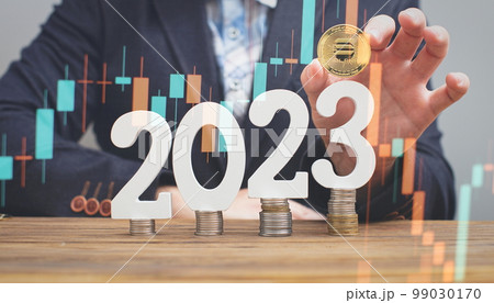 A businessman wants to invest in ethereum in 2023 to increase earnings in cryptocurrency A businessman wants to invest in ethereum in 2023 to increase earnings in cryptocurrency 99030170