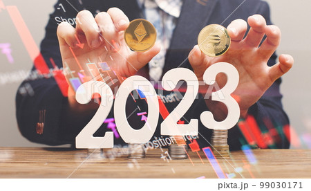 A businessman wants to invest in ethereum and bitcoin in 2023 to increase earnings in cryptocurrency A businessman wants to invest in ethereum and bitcoin in 2023 to increase earnings in cryptocurrency 99030171