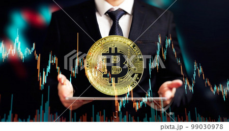 Cryptocurrency and investment. Businessman using tablet to connected on global network and gold bitcoin coin and growth of business graph, Financial, Stock market, 99030978