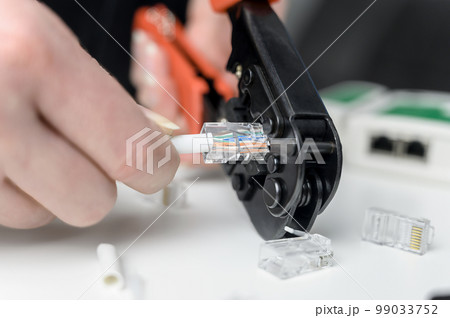 ethernet crimper - cable twisting tool. UTP Cat 5 Ethernet twisted pair connection procedure UTP cable, RJ45 LAN cable crimp. 99033752