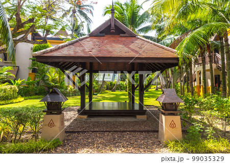 beautiful wooden gazebo in tropical nature in Thailand 99035329