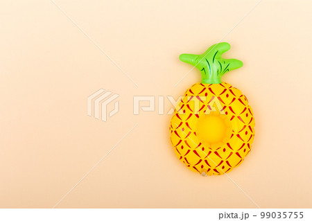 Inflatable cup holder on an orange background with copy space Inflatable cup holder on an orange background with copy space 99035755