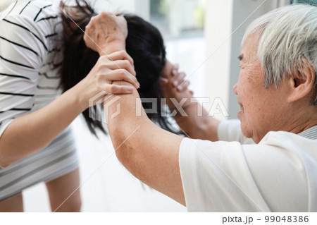 Angry asian old elderly patient with mood disorders,violent aggressive abnormal behavior,personality changes to violence,losing control over emotions,physical health problems,mental disorder concept Angry asian old elderly patient with mood disorders,violent aggressive abnormal behavior,personality changes to violence,losing control over emotions,physical health problems,mental disorder concept 99048386