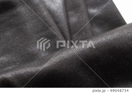 Black fabric with a beautiful shade, macro. Fashion 99048734