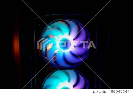 Computer cooler with RGB LED light. Computer circuit board and CPU cooling fans illuminated 99049544
