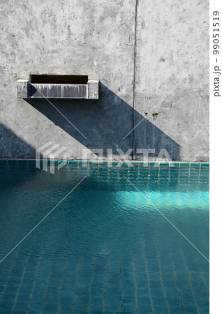 faucet of swimming pool on cement wall, construction industry faucet of swimming pool on cement wall, construction industry 99051519