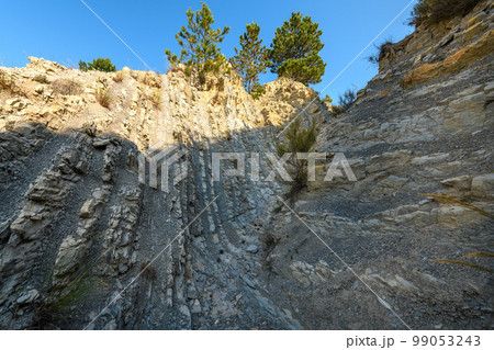 Folded geological layers in Provence, Drome. Folded geological layers in Provence, Drome. 99053243