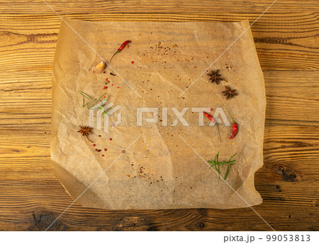 Brown Baking Paper with Herbs and Spices, Kraft Cooking Paper Sheet Texture Background, Bakery Parchment Brown Baking Paper with Herbs and Spices, Kraft Cooking Paper Sheet Texture Background, Bakery Parchment 99053813