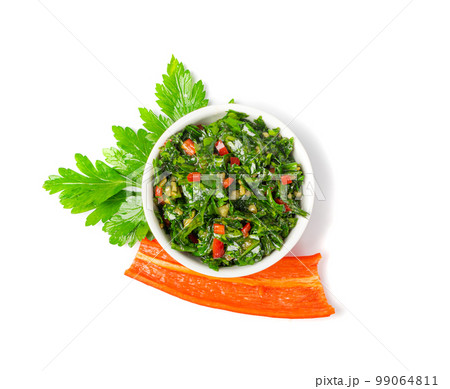 Chimichurri Sauce Isolated, Argentinian Steak Dip, Green Chimichuri with Herbs, Chopped Parsley, Garlic, Olive Oil 99064811
