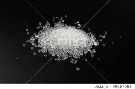 Desiccant Silica Gel Adsorbent Crystals on Black Background, Desiccant Polymer Balls 99067063